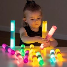 An illuminating set of 12 interactive loose parts light up cylinders incorporating technology skills and enabling all kinds of open ended play Ideal for children to experiment explore and discover Imagine using these glowing cylinders for a number of activities such as one to one correspondence sorting pairs sequencing You can literally light up learning in an open ended way Many children will find their own ways of using these glowing cylinders They may be a phone a snake a fence or even a rock Light Table Activities Preschool, One To One Correspondence, Infant Art, Sensory Swing, Stem Curriculum, Speculative Design, Light Unit, Sensory Lights, Sensory Rooms