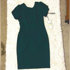 Calvin Klein Dark Green Royal Style Elegant Knee Length Dress Size- 4p Great Material Dark Green Will Give You Royal Look Unique Sleeve Can Wear To Conference, Job, Board Meeting, Or Fundraiser Events. You Only Need One Good Dress, Nothing More!!! Green Bodycon Dress For Office, Fitted Calvin Klein Midi Dress, Green Stretch Dress For Office, Green Mini Length Office Dresses, Calvin Klein Midi Office Dress, Green Lined Dresses For Work, Green Short Sleeve Mini Dress For Office, Green Lined Dress For Workwear, Green Bodycon Dress For Workwear