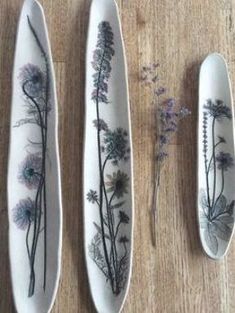 three spoons with flowers painted on them