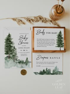 the wedding stationery was done in watercolor and gold foil, with pine trees