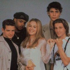 the cast of friends posing for a photo