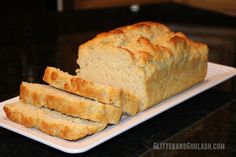 a loaf of bread sitting on top of a white plate