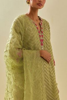 Green short kurta featuring floral silk applique motifs and bead sequin embroidered chevron patterns. Comes with embellished pant, scalloped hem dupatta and inner slip. - Aza Fashions Spring Festive Silk Sharara, Spring Silk Sharara With Zari Work, Spring Embellished Georgette Sharara, Traditional Silk Sharara For Spring, Spring Embroidered Silk Sharara, Spring Festive Embellished Dupatta, Traditional Embellished Spring Kurta, Spring Embroidered Organza Sharara, Spring Green Embellished Kurta