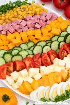 a platter filled with lots of different types of vegetables