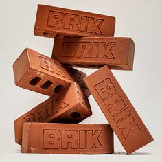 a stack of brick blocks with the word bark written on them