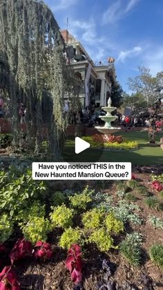 the front yard of a house with flowers and plants around it, which reads have you noticed this in the new haunted mansion queue? ages?