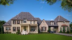 a large house with lots of windows in the front yard