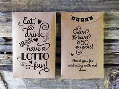 two brown paper tags with black ink on them, one says eat drink and the other says have a lot of fun