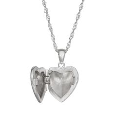 Featuring a gorgeous cubic zirconia stone, this beautiful sterling silver heart locket necklace is the perfect way to show your little one how much you love them. Featuring a gorgeous cubic zirconia stone, this beautiful sterling silver heart locket necklace is the perfect way to show your little one how much you love them. Pendant size: 14 mm x 11 mm Chain length: 15 in. Chain type: link Clasp: spring-ring Metal: sterling silver Plating: rhodium Finish: polished Packaging: boxedSTONE DETAILS St Antique Locket Necklace, Silver Round Locket Necklace For Valentine's Day, Silver Locket Necklace For Valentine's Day, Mother's Day Sterling Silver Locket Necklace Gift For Mom, Sterling Silver Locket Jewelry For Mother's Day, Sterling Silver Locket Necklace For Mom, Sterling Silver Locket Necklace Gift For Mom, Personalized Sterling Silver Locket Necklace For Mom, Personalized Silver Locket Necklace For Mom