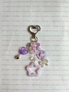 a keychain with charms attached to it