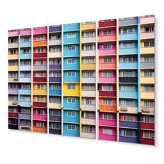 multicolored building with windows and balconies on the facade canvas wall art print