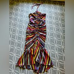 A Ruched Drawstring Adjusts The Fit And Length Of This Vibrantly Striped Halter Dress With A Flouncy Hem That's Ready For Everything From A Sashay To A Salsa. Halter Neck 100% Polyester Dry Clean Imported Item # 7241237 Worn Once For A Wedding, In Perfect Condition! Multicolor Ruched Silk Dress, Fitted Multicolor Ruched Maxi Dress, Fitted Multicolor Silk Maxi Dress, Fitted Multicolor Silk Midi Dress, Bohemian Ruched Fitted Midi Dress, Bohemian Fitted Midi Dress With Ruched Details, Multicolor Ruched Midi Dress, Multicolor Ruched Midi Dress For Vacation, Multicolor Ruched Midi Dress For Evening