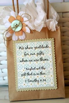 a brown paper bag with a cross on it and a quote from the book, we show gratefulness for our gifts when we use them