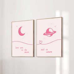 two pink posters with the words love you to the moon and stars on them in front of a white wall