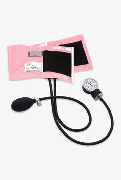 a stethoscope laying on top of a pink bag next to a blood pressure meter