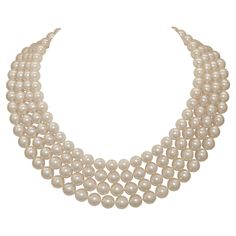 This four-strand Mikimoto Akoya pearl necklace is a masterpiece of elegance and luxury. The layout features four strands of meticulously arranged Akoya pearls, ranging from 9mm down to 7.5mm, creating a graceful tapering effect that accentuates the neckline beautifully. The Akoya pearls selected for this necklace are of the highest quality, characterized by their radiant luster, uniform shape, and smooth, flawless surfaces. The pearls' color feature pink/white tones, showcasing the natural beauty that Akoya pearls are renowned for. These beautiful four strands of pearls measure 18.75in (9mm - 8.5mm) - 17.25 in (9mm - 8.5mm) - 16.5 in (8.5mm -7.6mm) - 15.75 in (8.1mm - 7.5mm). The four strands can be joined in any style desired as well as worn traditionally stacked. Adding a touch of opulen Luxury Beaded Double Strand Pearl Necklace, Formal Multi-strand Pearl Necklace, Mikimoto Necklace, White Multi-strand Pearl Necklace For Formal Occasions, Mikimoto Pearls Necklace, Luxury Multi-strand Pearl Jewelry, Luxury Multi-strand Pearl Necklace For Wedding, Classic Multi-strand Pearl Necklace, Luxury Multi-strand Pearl Chain Necklace