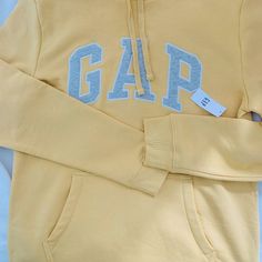 Gap Men’s Size M Heritage Logo Hoodie Pullover Yellow Long Sleeve Shirt Color: French Almond Yellow Size: M (Men's, Can Also Be Women's M-L) Gap Patch Logo On Front. Super Soft! New With Tag. Never Worn. Gap Cotton Crew Neck Hoodie, Gap Hooded Tops With Ribbed Cuffs, Gap Long Sleeve Tops With Drawstring Hood, Winter Sweatshirt By Gap, Gap Long Sleeve Fleece Sweatshirt, Gap Fleece Hoodie, French Almond, Yellow Long Sleeve Shirt, Heritage Logo