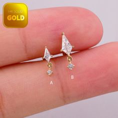 Metal: 14k solid gold, Available Gold color: Yellow gold  Guaranteed Authentic: 14k Solid Gold，Not Gold Plated or Gold Filled Stone:  CZ Thickness:0.82mm (20G) Stamp:14k ★Every ear is different, the length of backings that most suitable for your ear will depend on your ear thickness ★Titanium is a very safe metal, so we don't plate it, in order to avoid some people are allergic to the plating material. NOTE The item combined by 14k solid gold and implant grade titanium push in back,  packed in a beautiful Jewelry Box   SHIPPING ADDRESS All the orders will ship to the supplied address through your Etsy Order, Please leave your phone number,will give to carrier for safe deliver. We will not send and replacement parcels due to incomplete or inaccurate address.  PACKING ●Can be Gift packed inc Minimalist Gold Piercing With Diamond Cut, Minimalist Gold Diamond Cut Piercing, Minimalist Gold Piercings With Diamond Cut, 14k Gold Diamond-shaped Earrings, Earring Cartilage, Earring Dangle, Tragus Piercing, Flat Back Earrings, Cartilage Earring