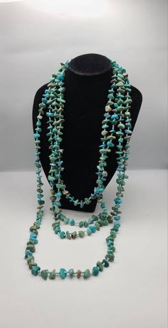 Vintage 925 Silver Hand Knotted Beaded Turquoise Necklace Item w#1054 Clean and in good condition  94 inches long with a toggle clasp 92.6 grams Marked 925 Welcome to Westgate Jewels!! We specialize in vintage estate, designer, and fine jewelry. Our shop consists of items that are estate, antique, and / or vintage conditions unless otherwise noted. This means that most items are prior owned and may have some imperfections such as light scratches, scuffs, and / or patina. Our items are cleaned an Cheap Vintage Turquoise Beaded Necklaces, Cheap Turquoise Long Beaded Necklace, Luxury Adjustable Beaded Turquoise Necklace, Long Turquoise Necklace, Antler Earrings, Turquoise Beaded Necklace, Vintage Native American Jewelry, Vintage Designer Jewelry, Turquoise Bead Necklaces