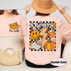 Paraprofessional Shirt, Retro Paraprofessional Fall Shirt Pumpkin, Para Squad Teacher Aide, Parapro Appreciation Gift, Gift For Parapro ↓ Click here to view our additional fashionable collections ↓ https://handcraftedbyhelenn.etsy.com Product Details: - 100% Cotton (fiber content may vary for different colors) - Medium fabric (5.3 oz/yd2 (180 g/m2)) - Classic fit - Tear away label - Runs true to size Care instructions: - Machine wash: warm (max 40C or 105F); - Non-chlorine: bleach as needed; - Tumble dry: Medium - Do not iron; Do not dry clean ● Please choose your preferred style, size, and color from the dropdown menu or leave us a message in the "notes to seller" section. ● We are committed to processing and shipping your items as quickly as possible, but please note that custom printing Thanksgiving Paraprofessional Shirt, Kindergarten Teacher Shirts, Teacher Things, Kindergarten Teacher, Fall Shirt