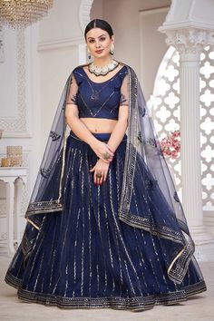 color-turquoise, fabric-net, work-embroidered, brand-name-krupali-savani,occasion-festivewear, occasion-wedding-guest, womenswear,ideal-for-women, lehengas, Product Features: Color: Teal Lehenga Fabric: Net Choli Fabric: Net Work: Embroidered Sleeves: Short Sleeves Neck Type: Round Neck Wash Care: Dry Clean Occasion: Festivewear, Wedding Guest Product Type: Lehenga Choli with Dupatta Disclaimer: There will be slight difference in digital to actual image Teal Lehenga, Blue Color Lehenga, Net Lehenga, Lehenga Choli Online, Lehenga Collection, Net Dupatta, Thread Embroidery, Lehenga Choli, Wedding Guest