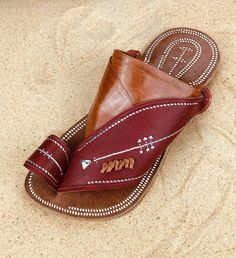 Use code COMBINEDSHIPPING and get $50 off your second pair. Check out all men's leather sandals: https://www.etsy.com/shop/sandcruisers/?section_id=25459641 You will love these traditional Arabian sandals. The straps and soles are made of leather. The leather lining will feel so soft and comfortable against your foot. They are designed to fit your foot loosely with lots of room in the toe-ring and straps. The leather sole will mold and shape to your foot over time, even creating an arch against Traditional Leather Flip Flops For Summer, Leather Flip Flops With Single Toe Strap For Festivals, Leather Single Toe Strap Flip Flops For Festivals, Leather Open Toe Flip Flops For Festivals, Traditional Leather Footbed Sandals For Beach, Leather Sandals With Rubber Sole For Festival, Traditional Beach Sandals With Stitched Sole, Summer Closed Toe Slippers With Stitched Sole, Traditional Leather Footbed Sandals For Summer