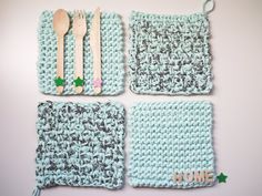 four crocheted placemats with forks and spoons on them are shown