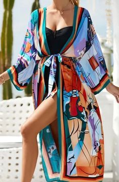 Birght abstract city scape kimono rayon layering piece Bohemian Kimono With Abstract Print For Vacation, Summer Kimono With Abstract Print And Kimono Sleeves, Multicolor Print Kimono For Vacation, Vacation Multicolor Print Kimono, Vacation Multicolor Printed Kimono, Multicolor Printed Kimono For Vacation, Spring Kimono With Abstract Print, Multicolor Long Printed Kimono, Oversized Multicolor Open Front Kimono