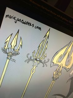 an image of three different swords on a computer screen