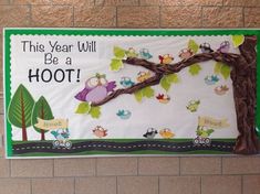 this year will be a hoot bulletin board on the wall in front of a classroom