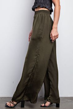 Give your wardrobe a stylish upgrade with these Olive Waist Elastic Wide Leg Satin Pants. Made of smooth satin fabric with an elasticized waistband, these pants provide a flattering fit while allowing for maximum comfort. The wide leg cut adds sophistication to your look. Fabric & fit: Model is wearing size Small. Satin Pants, Pants Large, Satin Fabric, Wide Leg, Satin, Elastic, Wardrobe, Pants, How To Wear