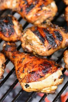 grilled chicken wings on the grill being cooked