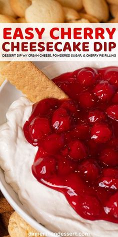 an easy cherry cheesecake dip in a bowl with crackers