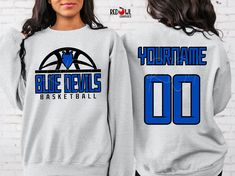 Personalized Blue Devil School Spirit T-Shirt Crewneck, Hoodie Hooded Sweatshirt Football, Baseball, Basketball, Softball, Track, Volleyball, Cross Country, Cheer, Wrestling Not all colors are available in all sizes and styles.  Please check the color and size charts in photos. We do our best to accurately represent shirt colors by using actual photos but do understand that all monitors will display differently. Please contact us prior to purchase with any questions on sizing or colors. Your purchase includes a custom imprint created specifically for your team! A product proof will be emailed to you within 1 business day.  Please keep an eye on your Etsy messages and reply with any changes within 24 hours. Your order will be sent to production after that time if no response is received. Ex Relaxed Fit Blue Pre-shrunk Sweatshirt, Blue Relaxed Fit Pre-shrunk Sweatshirt, Blue Long Sleeve Pre-shrunk Hoodie, Blue Crew Neck Sweatshirt For Fan Merchandise, Blue Sweatshirt With Team Name For Streetwear, Blue Streetwear Sweatshirt With Team Name, Blue Crew Neck Hoodie Fan Apparel, Blue Team Spirit Hoodie With Team Name, Blue Pre-shrunk School Spirit Sweatshirt