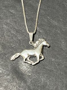 * Sterling Silver Horse Charm necklace  *Sterling Silver  *Free Shipping  *Handcrafted  *Jewelry ship in Gift box  All components are solid .925 silver.  Thank You For Your Looking ,And Check Out More Items In My Etsy Shop For More Great Deals, Also We Add More Jewelry To Etsy Shop regularly  www.etsy.com/shop/Silverlizzard  PLEASE check their dimensions, before setting the order.  NOTE -Once the parcel gets shipped out, it is usually needed 3-6 business days for every where in US Please keep in Classic Necklace With Horse Design For Gift, Matt Sturniolo Horse Necklace, Classic Horse Design Pendant Necklace, Classic Hallmarked Silver Charm Necklaces, Classic Silver Hallmarked Charm Necklaces, Horse Design Round Pendant Necklace As Gift, Horse Design Round Pendant Necklace For Gift, Round Pendant Necklace With Horse Design For Gift, Silver Jewelry With Horse Design In Round Pendant