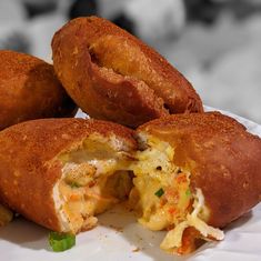 three fried food items on a white plate