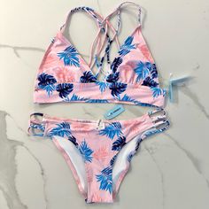 New With Tags. Tropical Palm Trees Pink & Blue Bikini Set. Cute Braiding Details On The Straps Of Both Bottom & Top. Size Medium. Smoke Free, Pet Free. Pink Strappy Swimwear For The Pool, Pink Strappy Swimwear For Pool, Pink Strappy Swimwear For Swimming, Pink Strappy Swimwear For Vacation, Pink Summer Tankini With Tropical Print, Pink Tankini With Tropical Print, Pink Tropical Print Summer Tankini, Pink Strappy Swimwear, Pink Tropical Print Tankini For Vacation