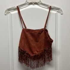 Sexy Suede Crop Top With Fringe. Rust Color. With Tags. Never Been Worn. Excellent Condition Summer Brown Cami Crop Top, Brown Cami Crop Top For Summer, Fitted Fringe Cropped Crop Top, Fitted Fringe Crop Top, Sleeveless Crop Top For Fall Party, Fitted Sleeveless Crop Top With Fringe, Fitted Sleeveless Fringe Crop Top, Brown Fringed Tops For Festival, Brown Cropped Party Top