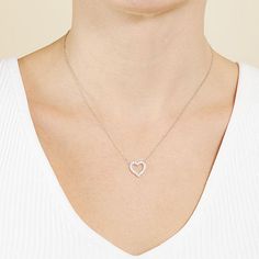 Simple and sleek best describes this Silver Treasures sterling silver Cubic Zirconia heart pendant necklace. This necklace is crafted in quality sterling silver, features beautiful sparkling Cubic Zirconia stones, comes in 16 inches with a 2 inch extender and has a spring ring clasp for a safe and comfortable wear. Wear this pendant necklace alone or stack with your other favorite necklaces. Wipe necklace clean with a soft cloth.Features: Nickel FreeJewelry Closure: Spring Ring ClaspLink Constru Sterling Silver Heart Pendant Necklace With Brilliant Cut, Sterling Silver Heart Necklace With Brilliant Cut Pendant, Silver Heart Pendant Necklace With Brilliant Cut, Sterling Silver Brilliant Cut Heart Pendant Necklace, Sterling Silver Heart Necklace With Brilliant Cut, Cubic Zirconia Open Heart Necklace In Fine Jewelry Style, Diamond White Heart-shaped Sterling Silver Necklace, Open Heart White Gold Necklace With Cubic Zirconia, Dainty Silver Diamond Heart Necklace