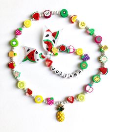 Hello everyone, welcome to my shop. This is a personalized/customized fruit stretch bracelet and necklace set for little girls. Perfect for girls as everyday summer jewelry. I will choose random fruits and ribbons to make your bracelet, I will always try to get as close as possible to original but stock may vary. I will need to know the name of your child (leave me a note at checkout section) and your child's wrist. (in inch- find your size in the menu) Can be made without the ribbon, leave me a Cheerful Handmade Jewelry Gift, Cute Summer Jewelry For Birthday, Personalized Colorful Fun Jewelry, Cute Summer Birthday Jewelry, Handmade Sweet Summer Jewelry, Sweet Handmade Summer Jewelry, Playful Summer Jewelry For Gifts, Playful Summer Jewelry Gift, Playful Summer Jewelry As A Gift