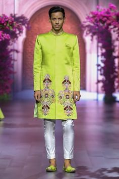 Sage green sherwani with placement flower bouquet embroidery. Paired with a pant. - Aza Fashions Festive Designer Sherwani With Floral Embroidery, Designer Sherwani With Floral Embroidery For Eid, Designer Pista Green Sherwani With Chikankari Embroidery, Eid Green Sherwani With Floral Embroidery, Designer Festive Pista Green Sets, Designer Traditional Wear With Floral Embroidery For Ceremonial Events, Designer Ceremonial Traditional Wear With Floral Embroidery, Green Bandhgala With Floral Embroidery For Eid, Fitted Pista Green Kurta For Reception