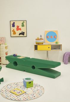 a child's play room with toys on the floor