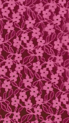 a pink and brown background with flowers on it