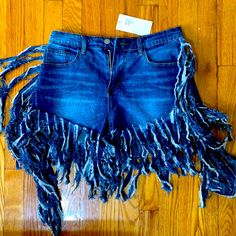 Fringe Jean Shorts Size Medium, Very Stretchy. Will Fit A Size Small For A Baggy Look Or Large For A More Fitted Look. Trendy Denim Blue Bottoms With Fringe, High Waist Bottoms With Frayed Hem For Festival, Trendy Medium Wash Festival Bottoms, Cotton Cutoff Bottoms For Festival, Cutoff Cotton Bottoms For Festival, Denim Blue Cotton Bottoms For Festival, Fitted Denim Shorts For Festivals, Festival Denim Blue Cotton Bottoms, Blue Frayed Hem Shorts