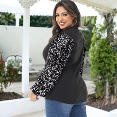 Elevate your party attire with our Anna-Kaci Women's Plus Size Sparkle Sequin Sweatshirt. Featuring a sparkly sequin design with long balloon sleeves and a mock neckline, this sweatshirt offers a relaxed fit and is suitable for various occasions from parties to dance shows. Long Sleeve Tops For Christmas Night Out, Black Tops For Christmas Party, Black Party Tops For Christmas, Black Christmas Party Tops, Black Christmas Party Top, Winter Long Sleeve Sequin Top, Fall Party Blouse With Crew Neck, Black Sequined Tops For Winter, Black Long Sleeve Top For Party Season