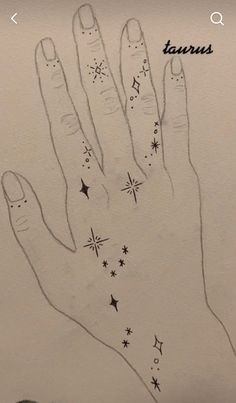 a drawing of a hand with stars on it and the words taurus written in black ink