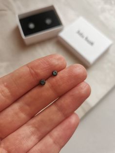 The latest addition to my 'Lunar' range, with an oxidised finish. One of the wonderful things about these earrings is that due to the way they are made each one is unique, even within a pair. These studs are the small size and are approximately 4-6mm wide, they are an irregular item so not perfectly round, which adds to the charm! The ear post is 11mm long and 0.8mm wide. Studs are supplied with a scroll back. The black effect is oxidised silver, it is a surface colouring that will wear back to silver in time. This listing is for one pair of studs. My jewellery is all handmade by me in my workshop in Herefordshire. All items are made from sterling silver, due to their weight smaller items aren't hallmarked. Your jewellery will be supplied in a Julia Smith gift box. SHIPPING: GOODS ARE SENT Hand Forged Black Earrings For A Gift, Hand Forged Black Earrings As A Gift, Everyday Black Oxidized Earrings, Julia Smith, Black Effect, Oxidised Earrings, Black Stud Earrings, Black Stud, Silver Anklets