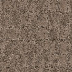 an image of a brown carpet textured with small circles and dots on the surface