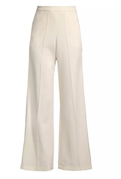 Turn heads with these high-waisted bootcut trousers! With their sleek pintuck design and daring high-waist, these trousers are your go-to for any bold fashion statement. Ready for the runway? Make a statement with these trousers! Style #: F3-S16-358-PNT Content: 92% Polyester, 8% Spandex Side pockets Pin tuck details boot cut Sideseam zipper Model is a size 5'8" and wearing a size Small Dry Clean Only See size chart HERE Read the Return and Change Policy Styling Pants, Bootcut Trousers, Boot Cut Pants, Workwear Brands, Striped Wide Leg Pants, Sleeves Designs For Dresses, Leg Work, Bootcut Pants, Work Wear Women