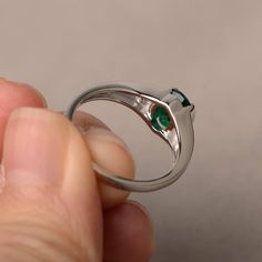 This is a gorgeous handmade creation. Its beauty is its simplicity & Elegance. The 6*8mm oval shape faceted lab emerald is crafted in solid sterling silver and with rhodium plated. All item is sent in a beautiful gift box If you have any idea of design your ring,pls contact me directly. You can realize more lovely stuff clicking the link https://www.etsy.com/shop/knightjewelry?refshopsection_shophome_leftnav Please leave the correct address and you phone number for delivering successfully. Polished Emerald Ring For Wedding, Wedding Emerald Ring Oval Cabochon With Polished Finish, Emerald Oval Cabochon Ring For Anniversary & May Birthstone, Oval Emerald Birthstone Ring For May, Oval Emerald May Birthstone Ring, Oval Emerald Birthstone Ring In White Gold, Oval Emerald Ring With Bezel Setting For Promise, Oval Emerald Ring With Birthstone, Oval Emerald Rings With Polished Finish